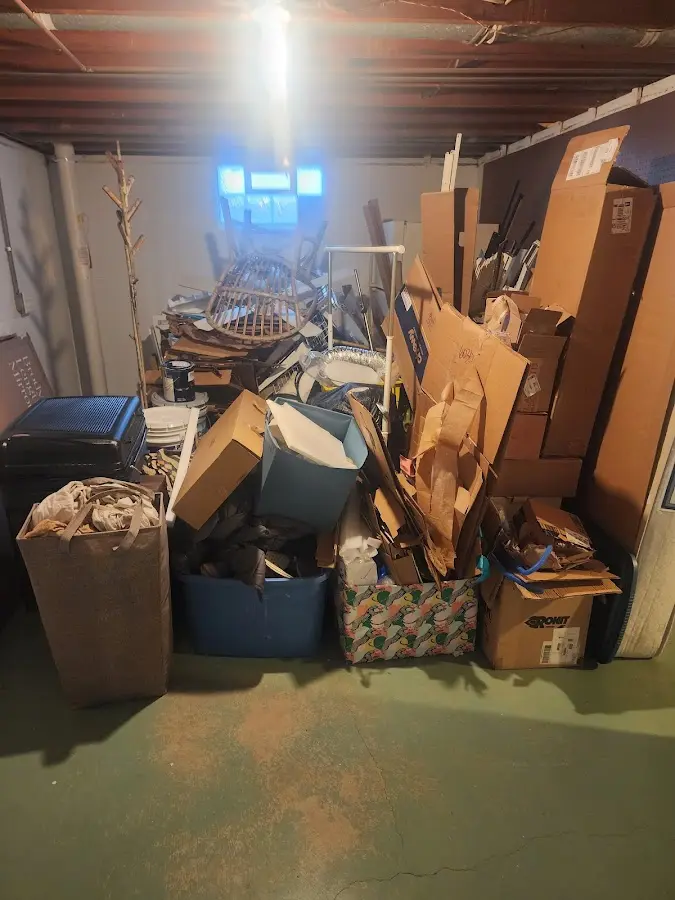 Roll-off dumpster container at job site for 15 Yard Dumpster Rental in Overlea